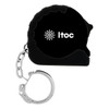 A small black mini tape measure with a keychain attachment and a logo.