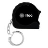 A black mini tape measure with a silver keychain attachment and a logo on the side.