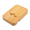 A bamboo charging station featuring a sleek, minimalist design and an indented area for a phone or device.