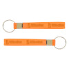 An orange silicone strap keytag with a metal ring and branding, featuring a smooth design.