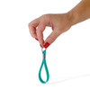 A turquoise silicone strap keytag is held by a hand, featuring a simple loop design and a metal keyring.