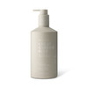 A cream bottle in a neutral beige shade with a pump dispenser, featuring a logo and "Great Barrier Reef" branding.