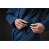 A women's quilted puffer jacket in blue, featuring a zip pocket and adjustable drawstring.