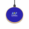 A circular wireless charger in blue with a wooden base and a logo on the surface.