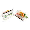 A clear package containing mixed lollies, with a card featuring a logo. The lollies are colourful and assorted.