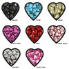 A variety of heart-shaped chocolates in black, blue, gold, hot pink, red, rose gold, silver, and light pink.