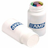 A white pill jar containing colourful chocolate beans, with a logo on the jar.