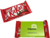 A red KitKat chocolate bar with a green sleeve packaging, featuring branding and product details.
