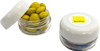 A small clear screw cap jar containing yellow choc beans with a white lid and branding on the top.