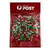 A round confectionery item with red, green, and white speckles, packaged in a clear bag with a logo.