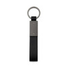A black keytag with a metal ring and a rectangular metal plate attached. Simple and stylish design.