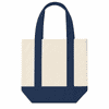 A mini canvas tote in cream and navy blue, featuring two handles and a small pocket on the front.
