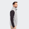A grey men's hybrid vest with a high collar, featuring a zip front and side without sleeves.