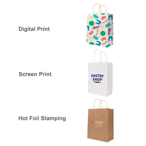 A selection of three Kraft paper bags, featuring colourful patterns, simple text, and a plain brown option; each has handles.