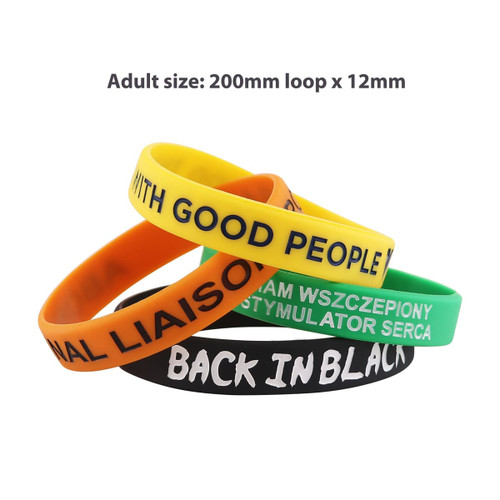 Four debossed silicone wristbands in yellow, orange, green, and black, featuring various text and a logo.