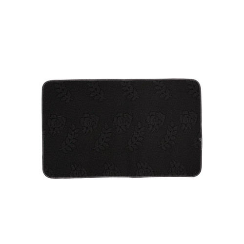 A black flannel mat featuring a textured design and a logo. The mat has a soft, plush surface.