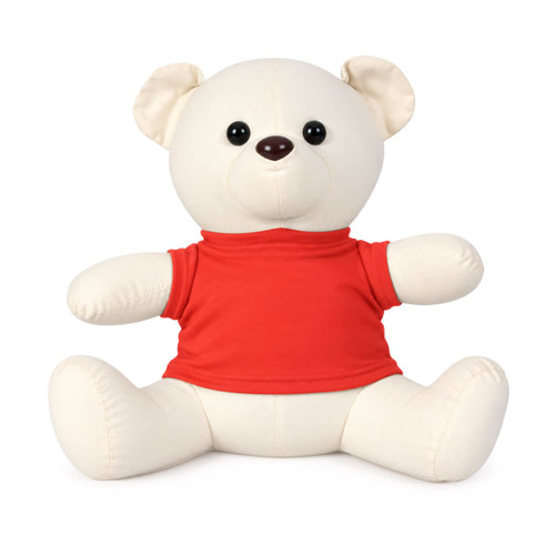 A plush bear in a red shirt, featuring a cream-coloured body and black eyes, seated with arms outstretched.