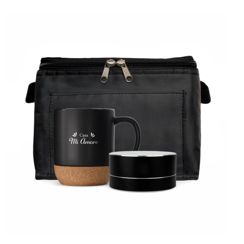 A black coffee mug with a cork base and a speaker in a black carrying pouch. The pouch features a zip closure.