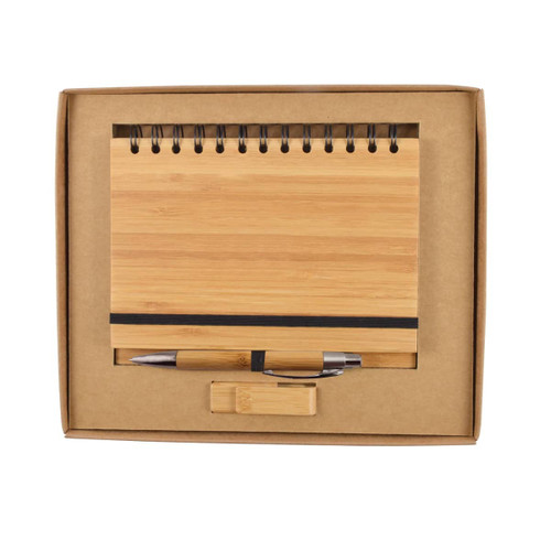A bamboo notebook and silver pen set displayed in a kraft gift box with a black elastic band.