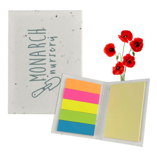 A sticky note pad with a speckled cover featuring a logo, containing colourful sticky notes in pink, orange, green, and yellow.