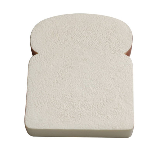 A squishy stress relief shape designed like a slice of bread, featuring a beige colour with a textured surface.