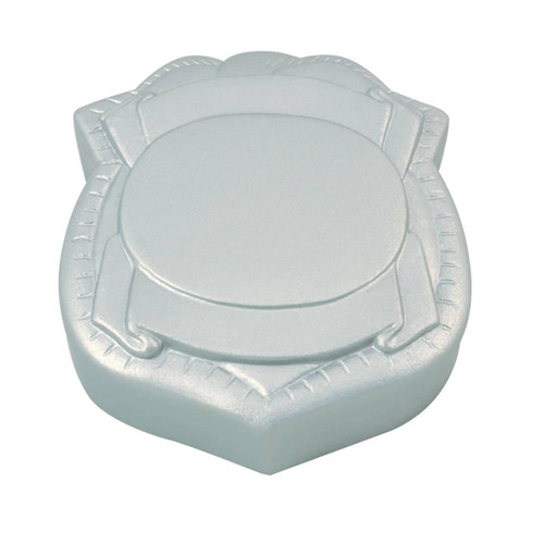 A light blue stress badge in a shield shape, featuring a smooth, rounded surface and a textured border.