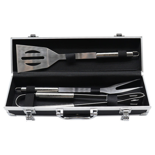 A stainless steel BBQ tool set including a spatula, fork, and tongs, housed in a black deluxe case with a handle.
