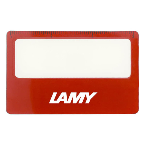 A red pocket ruler magnifier with a clear viewing area and a logo. It features a ruler marked in centimetres.