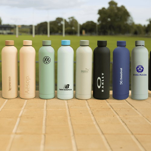 A drink bottle collection featuring pastel and dark colours with various logos displayed on each bottle.
