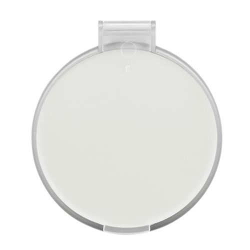 A compact mirror featuring a round design with a clear outer casing and a smooth, reflective surface.