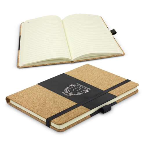 A cork-covered Inca Notebook with a black elastic band, featuring lined pages and a logo on the cover.