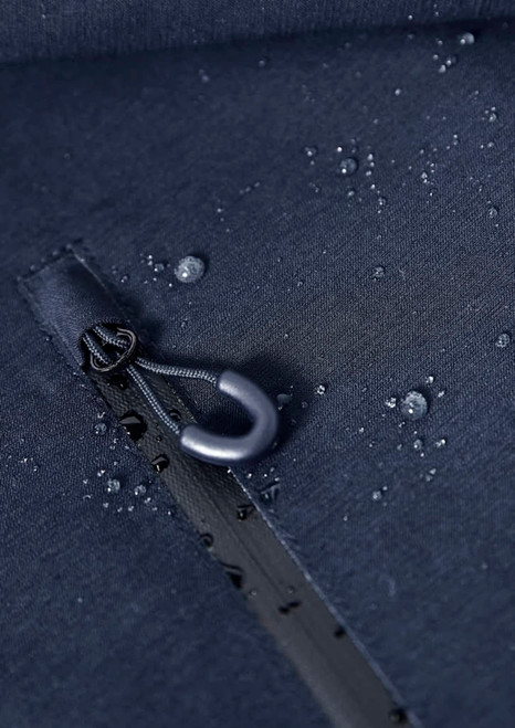 A navy blue rain jacket with water droplets on the fabric, featuring a zipper and a branding label.