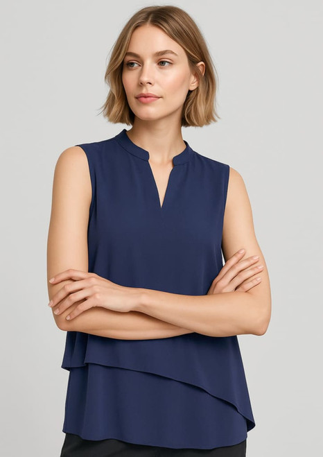 A sleeveless layered blouse in navy blue, featuring a stand-up collar and a flowing design. It has a logo.