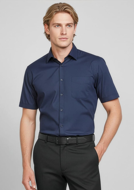 A button-up short sleeve shirt in navy blue, featuring a pocket and a branded logo.