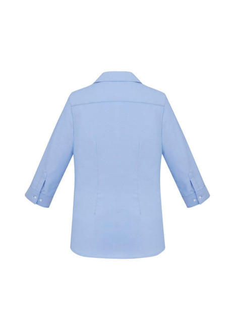 A light blue women's button-up shirt featuring 3/4 sleeves and a collared neckline, with a logo visible.
