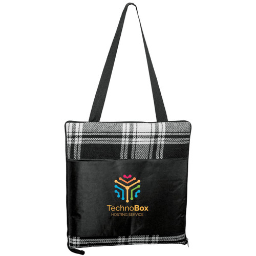 A large picnic rug in black and white plaid, featuring a logo on the front and a carrying strap.
