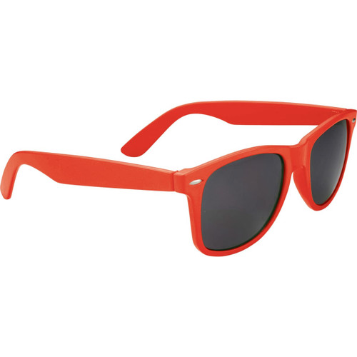 A pair of red sunglasses with dark lenses and a logo on the side. Ideal for leisure and outdoor activities.