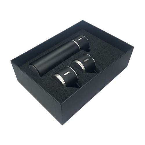 A drink bottle and two matching cups in a black gift box, featuring a sleek black design with silver accents.