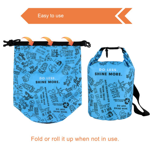 A blue dry bag with a foldable design and graphic patterns, featuring an adjustable strap and a logo.