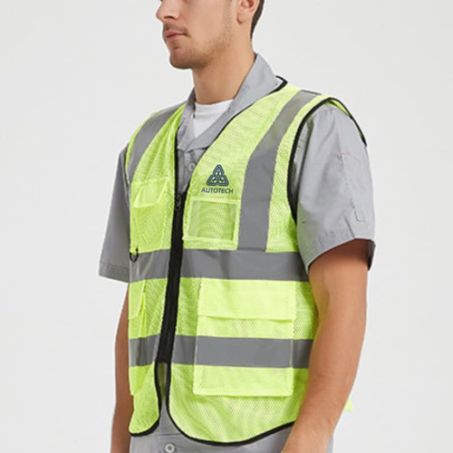 A bright yellow hi-vis vest featuring reflective tape and multiple functional pockets, with a logo on the front.