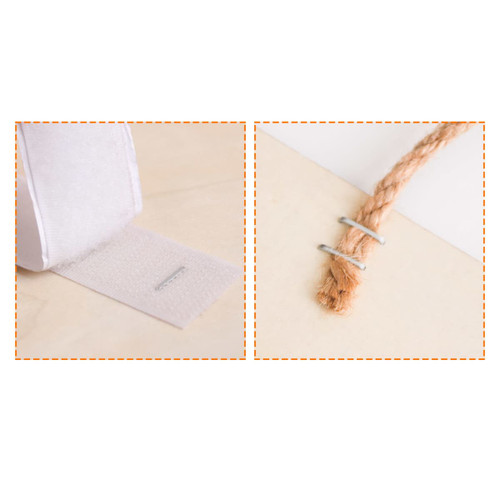 A close-up of a textured white strap with a silver clip and a brown twine tied with a metal clip.