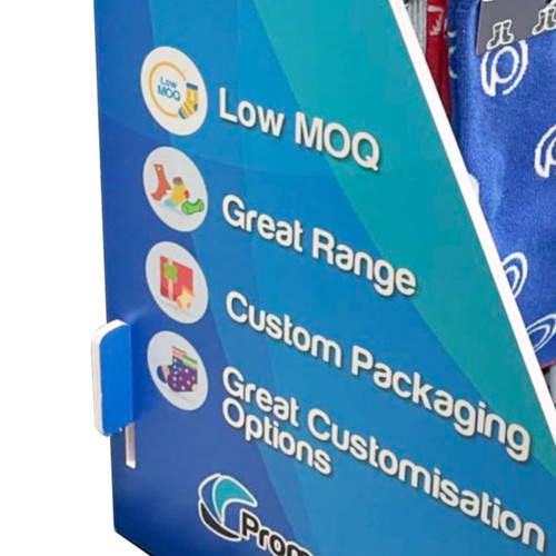 A display stand featuring various patterned socks, predominantly in blue and red, with a logo and promotional text.