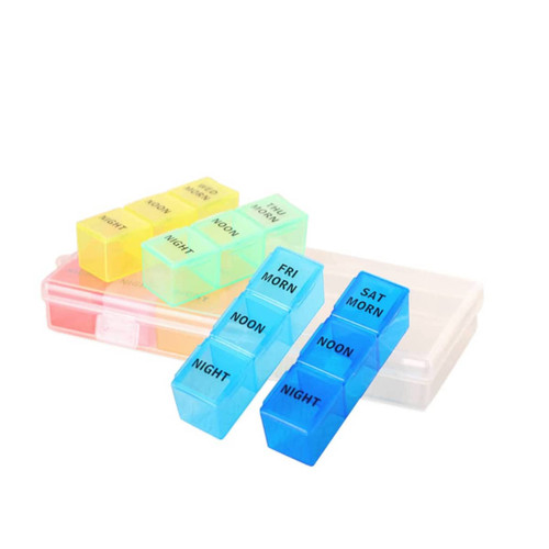 A set of colourful pill organisers in blue, yellow, and pink, housed in a clear container, featuring compartments for days and times.