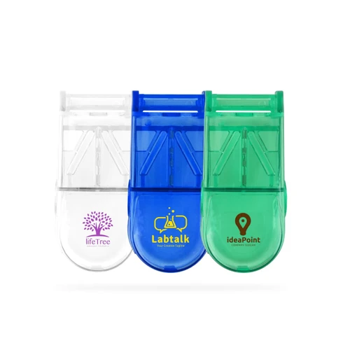 Three pill boxes in clear, blue, and green with a built-in cutter, featuring various logos on each.