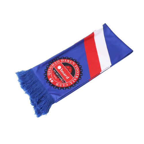A knitted polyester scarf in blue with red and white stripes, featuring a logo in the centre and tasselled ends.