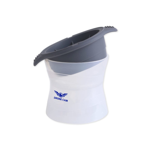 A grey and white whisky ice ball mould with a branding logo on the side.