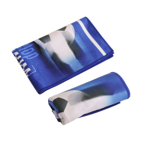 A blue sports towel featuring a soccer ball design, folded and rolled for convenience. Includes branding details.