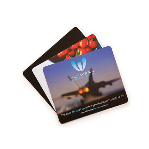 A set of three mouse mats featuring various designs, including a logo, in black, white, and a colourful image.
