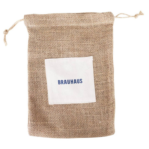 A jute net produce bag in brown, featuring a white patch with a logo. The bag has a drawstring closure.