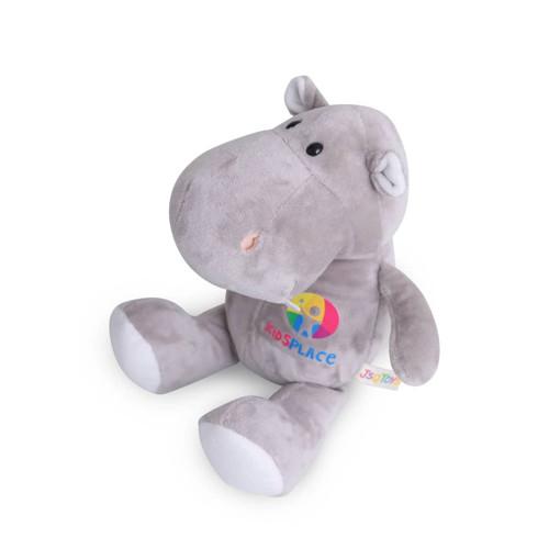 A grey hippopotamus plush toy with a friendly expression and a colourful logo on its body.